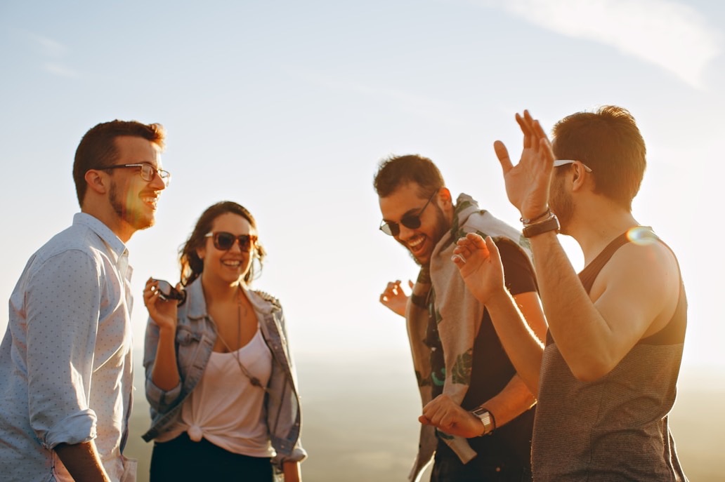 Group of young people socializing outdoors